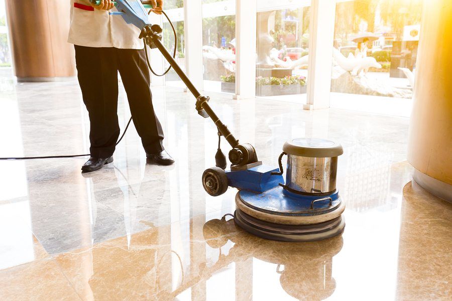 Skilled technicians polishing marble surfaces